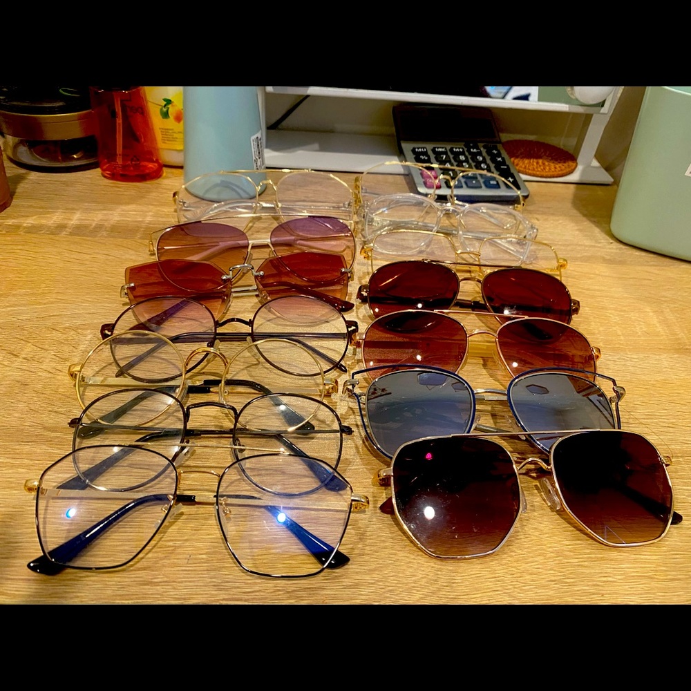 14 pairs of prescription glasses